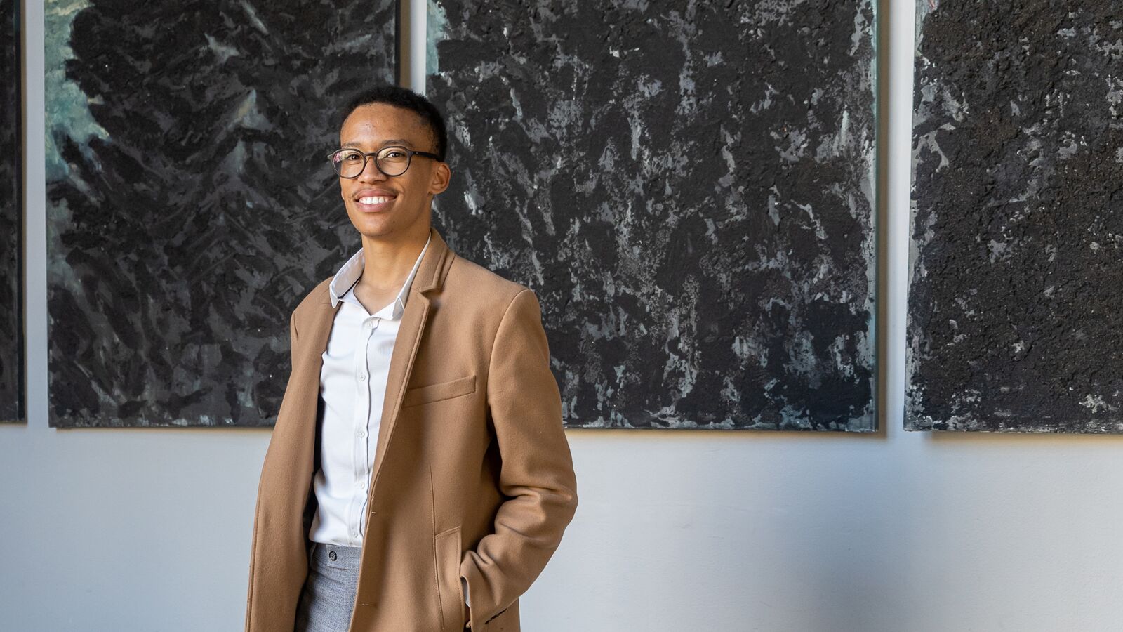 A Dell Young Leaders programme alumnus smiles in an office