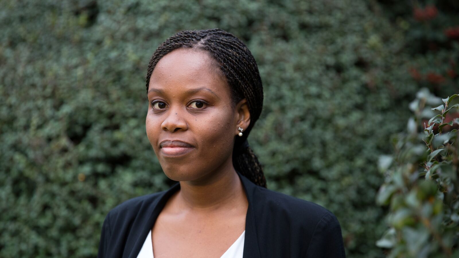 The first graduate of the Dell Young Leaders programme smiles in an outdoor setting